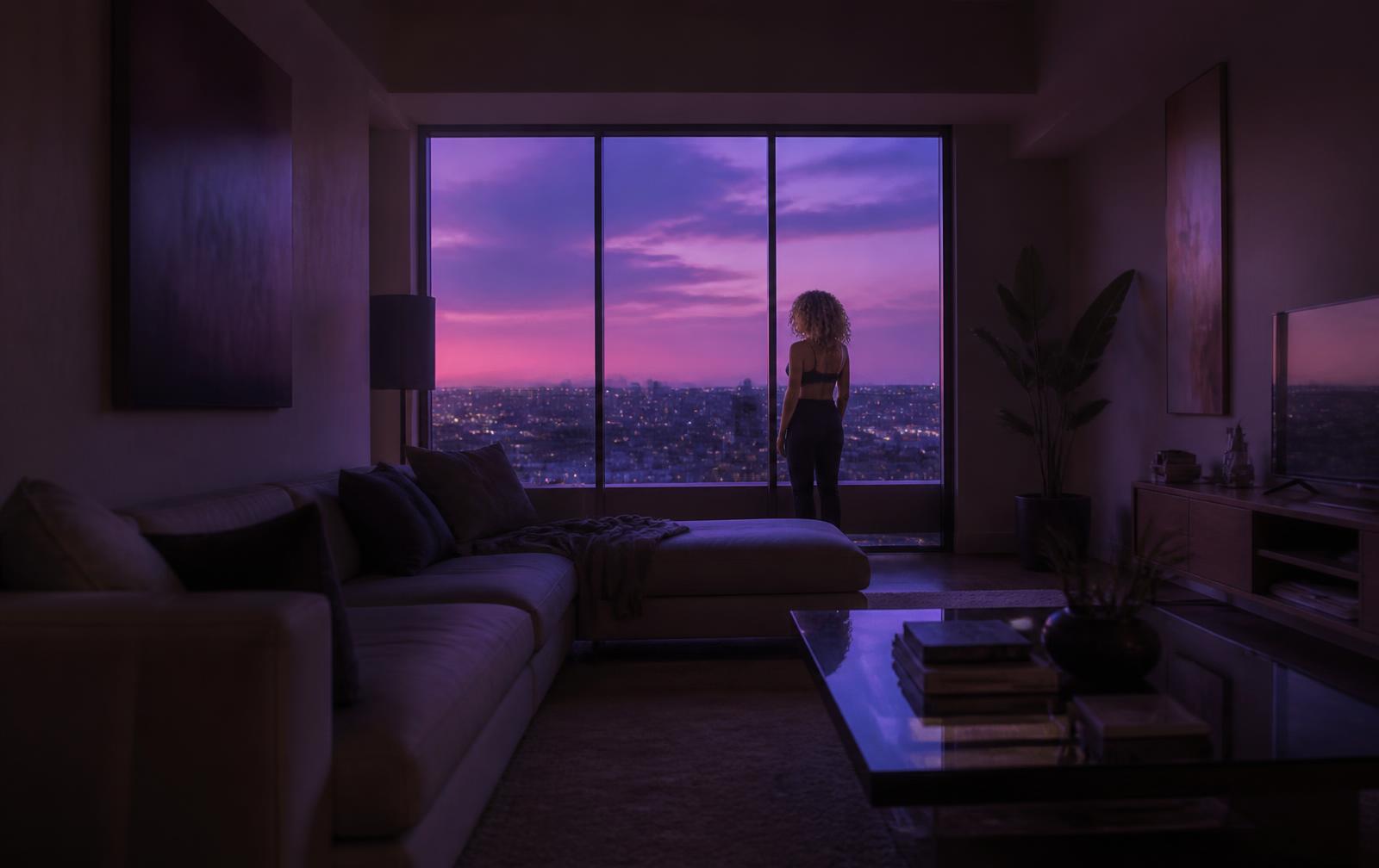 37 Views still — a figure alone in a glass apartment above the night city
